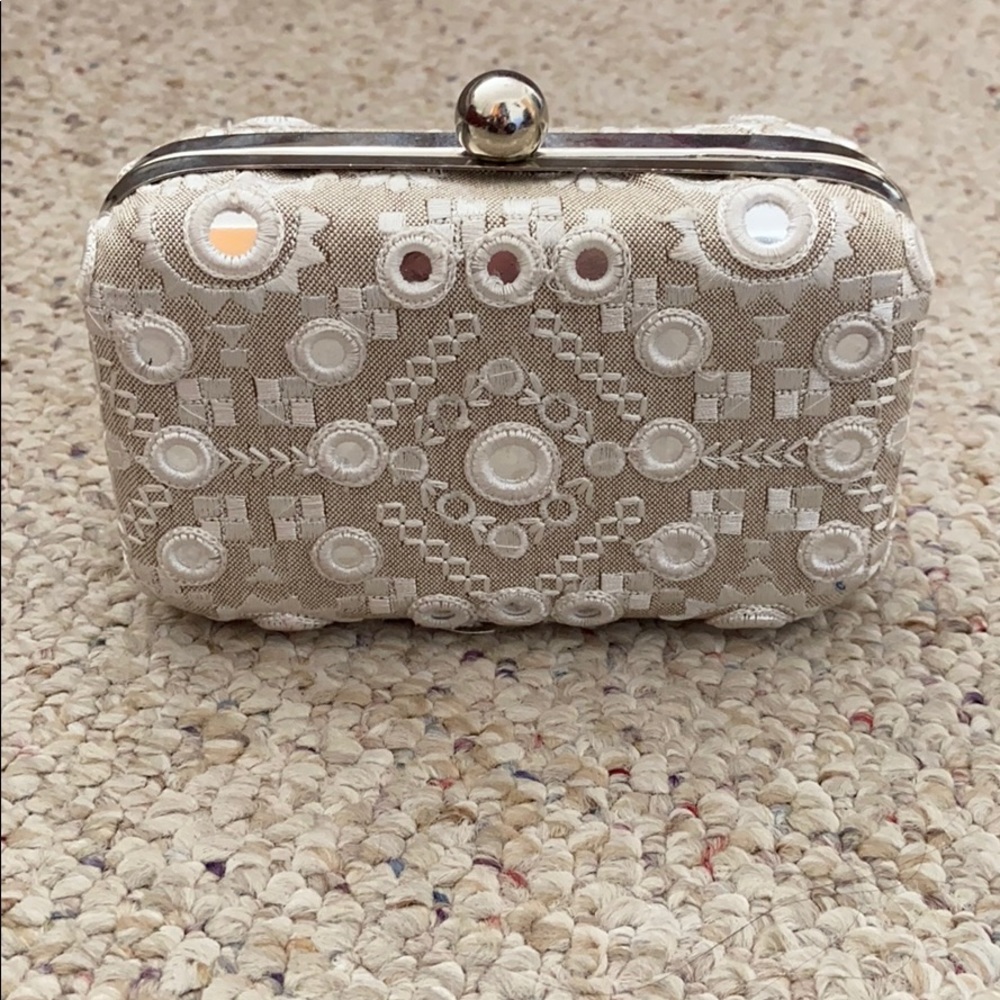 Cream and ivory clutch